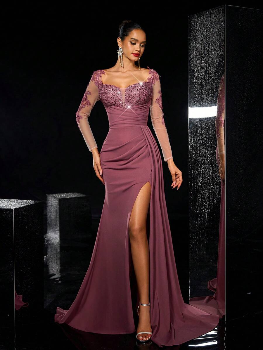 Vestido elegante y lujoso con aplicaciones de encaje bordad