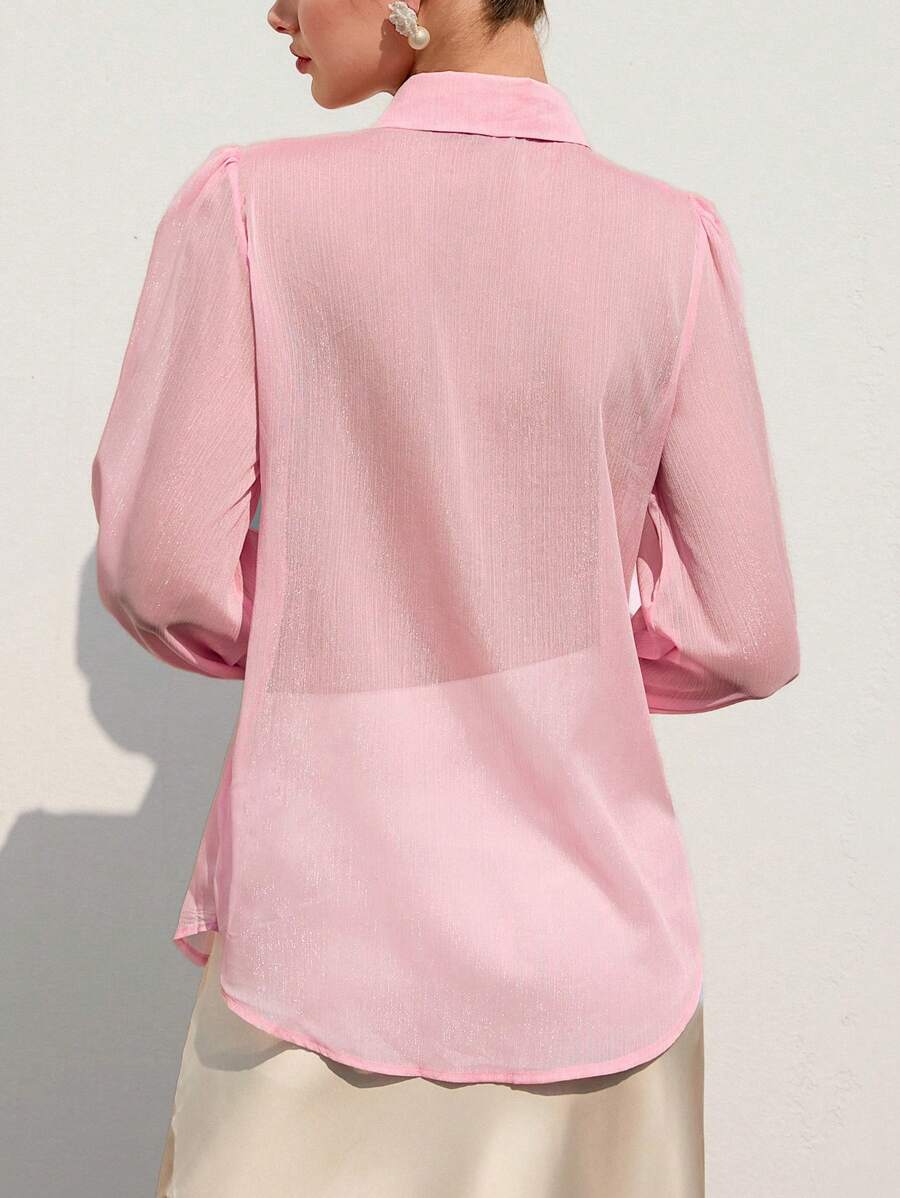 Blusa de manga larga con cuello de volantes