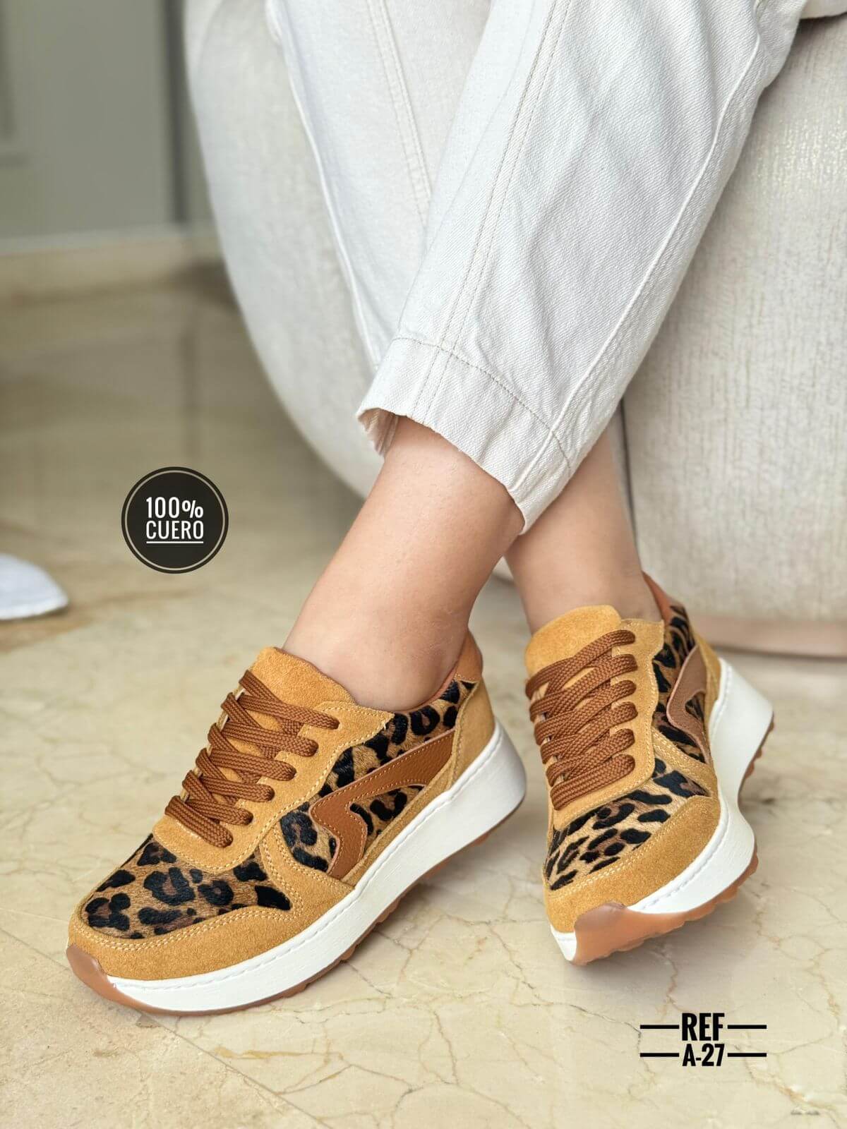 Tenis de detalles cuero