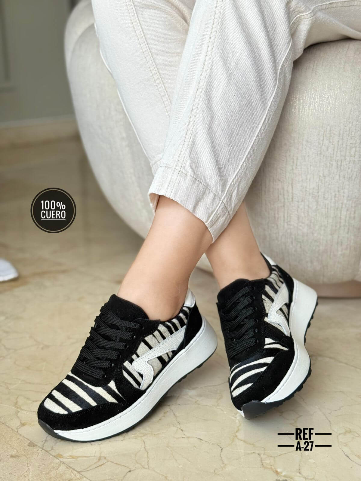 Tenis de detalles cuero