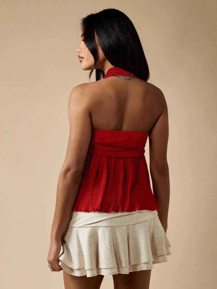 Blusa de muñeca sin mangas con pliegues