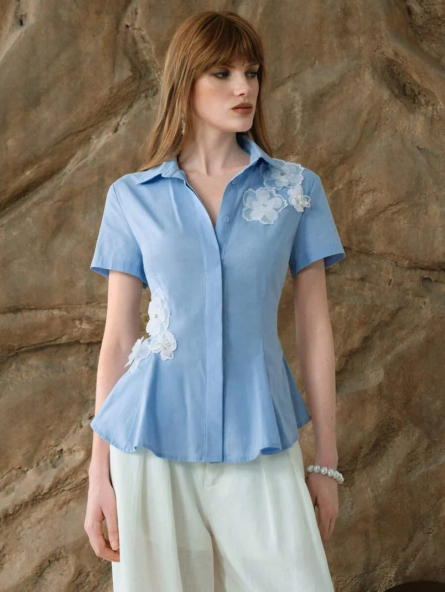Blusa elegante de manga larga con estampado floral