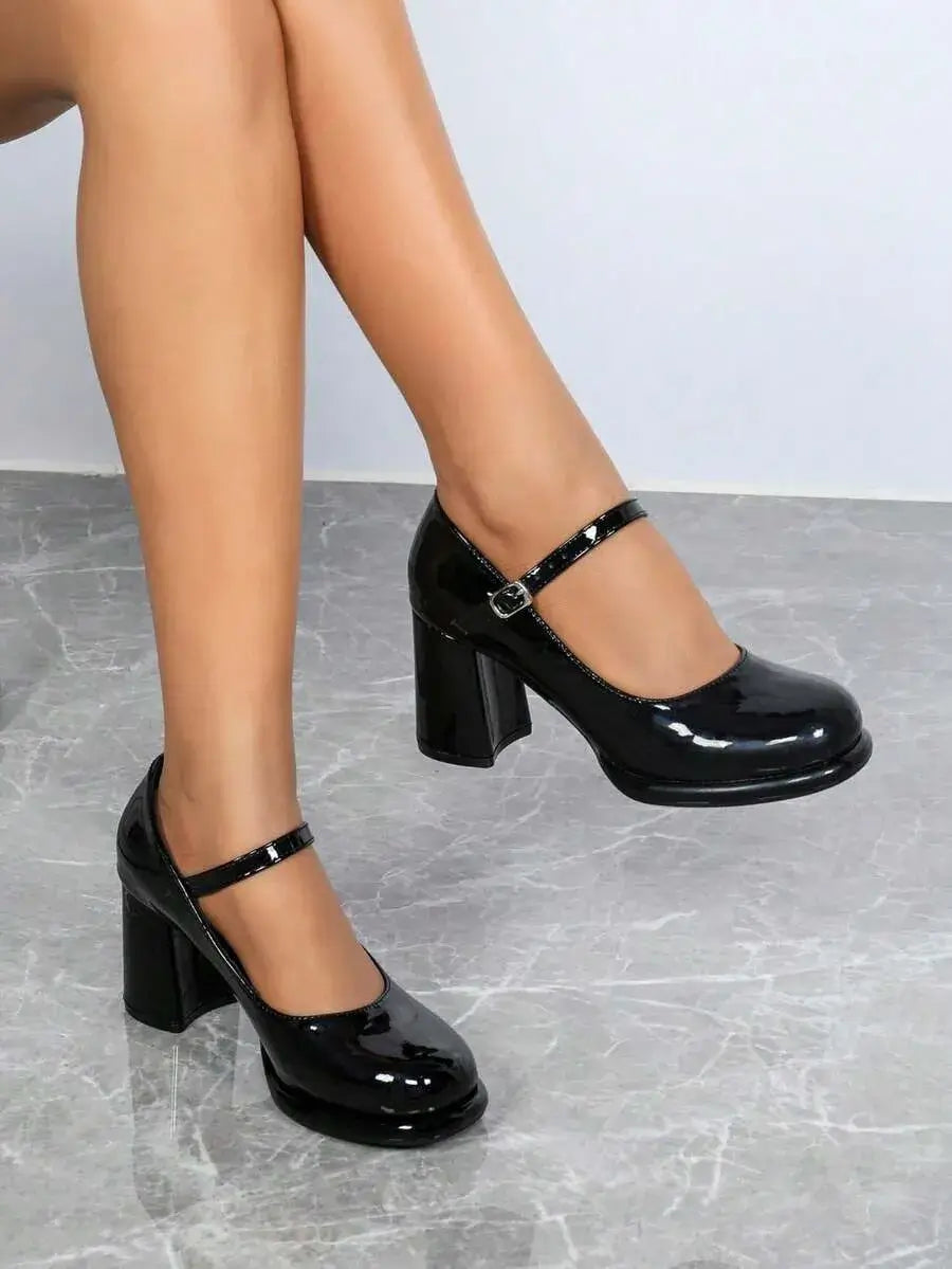 Zapatos de tacón alto con punta redonda