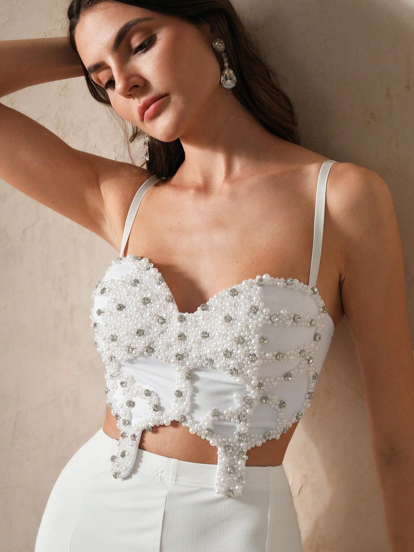 Top mariposa con perla