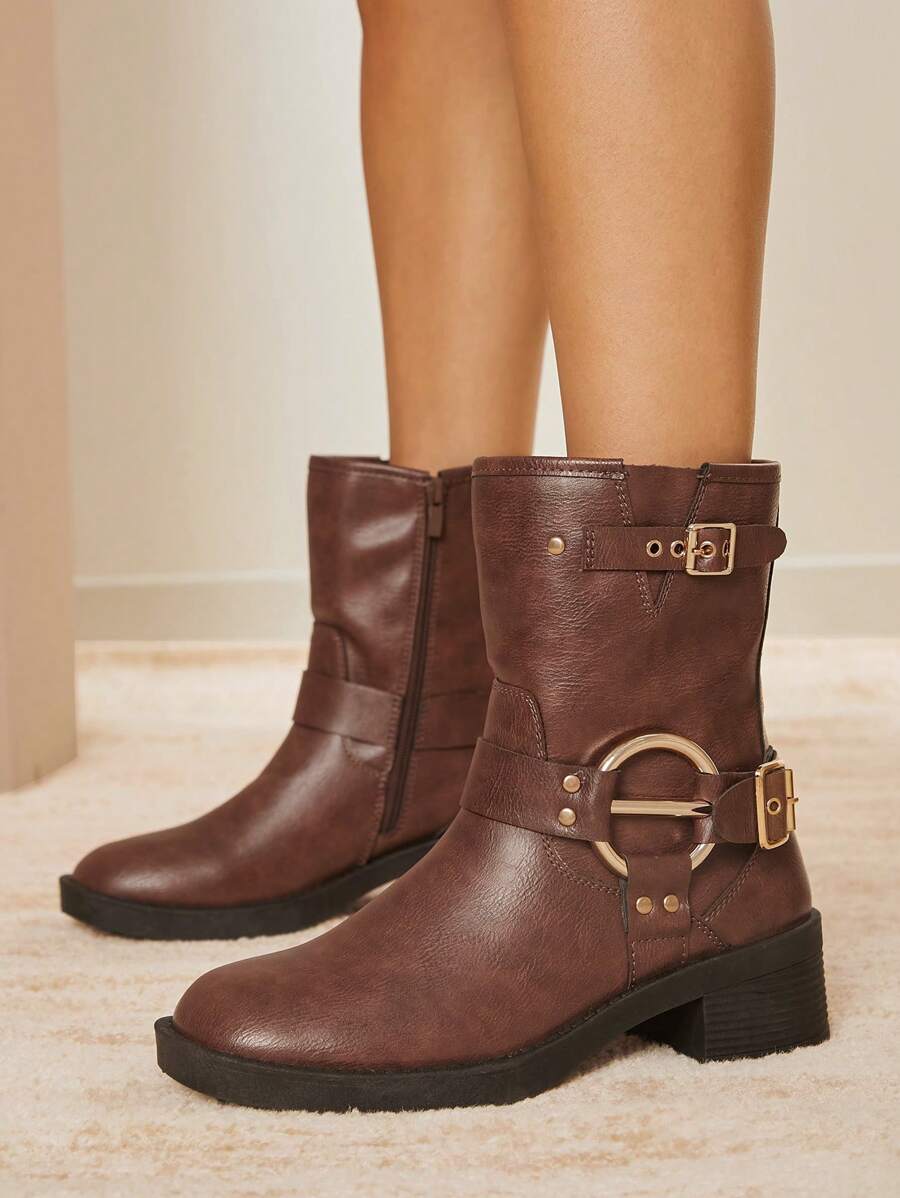 Botas de estilo motero con plataforma alta y hebilla en el tobillo para mujer