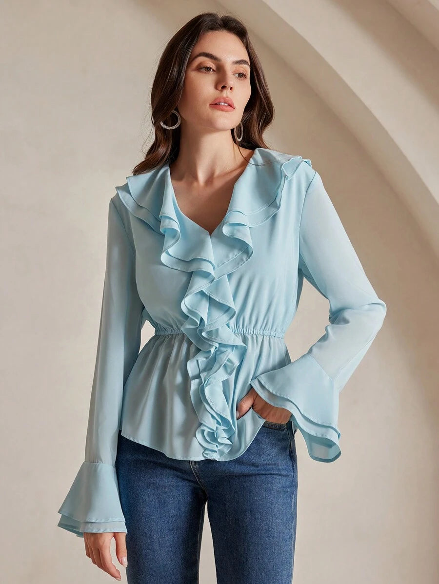 Blusa de manga larga con cuello de volantes