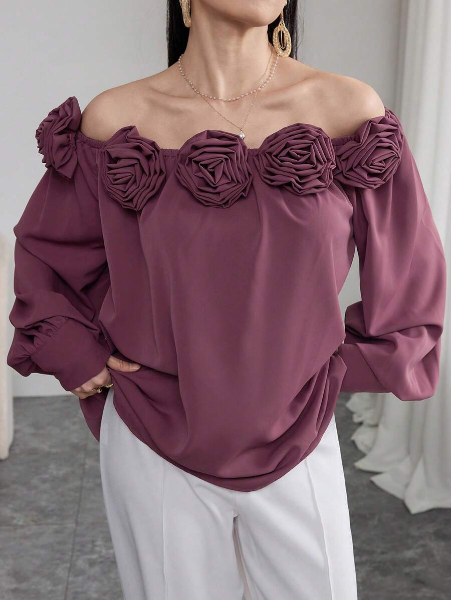 Blusa elegante y romántica de mujer con hombros descubiertos