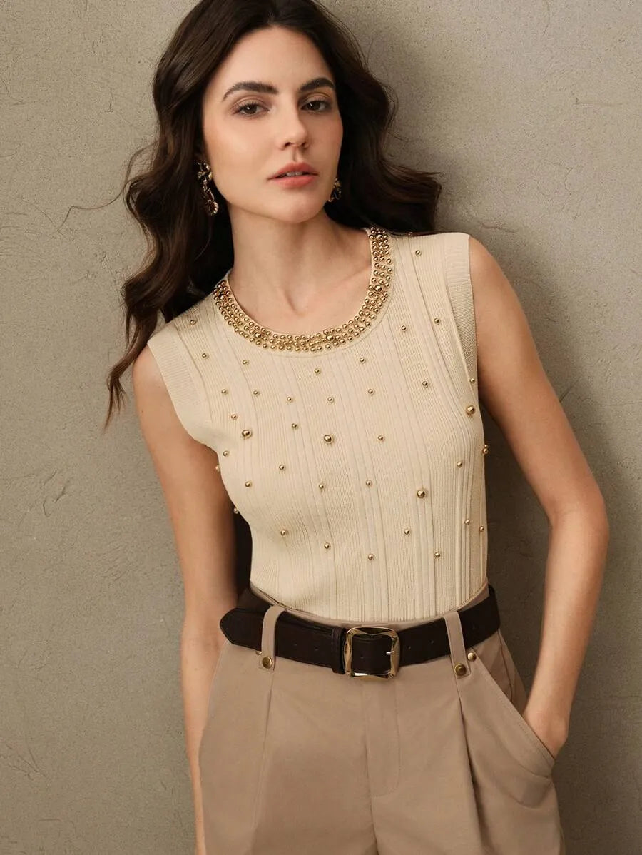 Blusa de punto elegante y moderna sin mangas