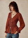 Blusa de manga larga con cuello en V