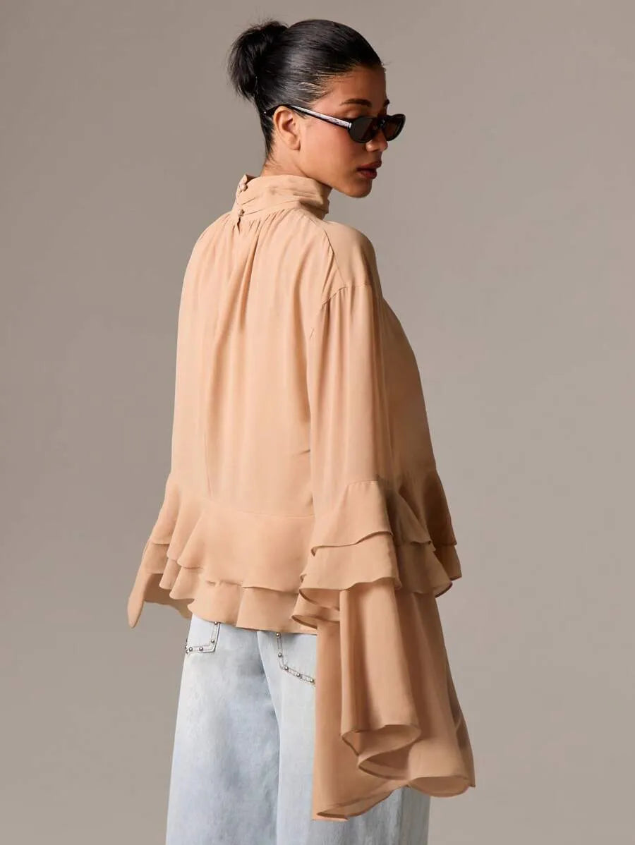 Blusa elegante de gasa bohemia con cuello alto
