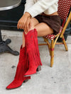 Botas altas hasta la rodilla con flecos