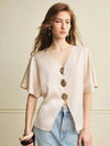 Blusa de mujer elegante con decoración de metal