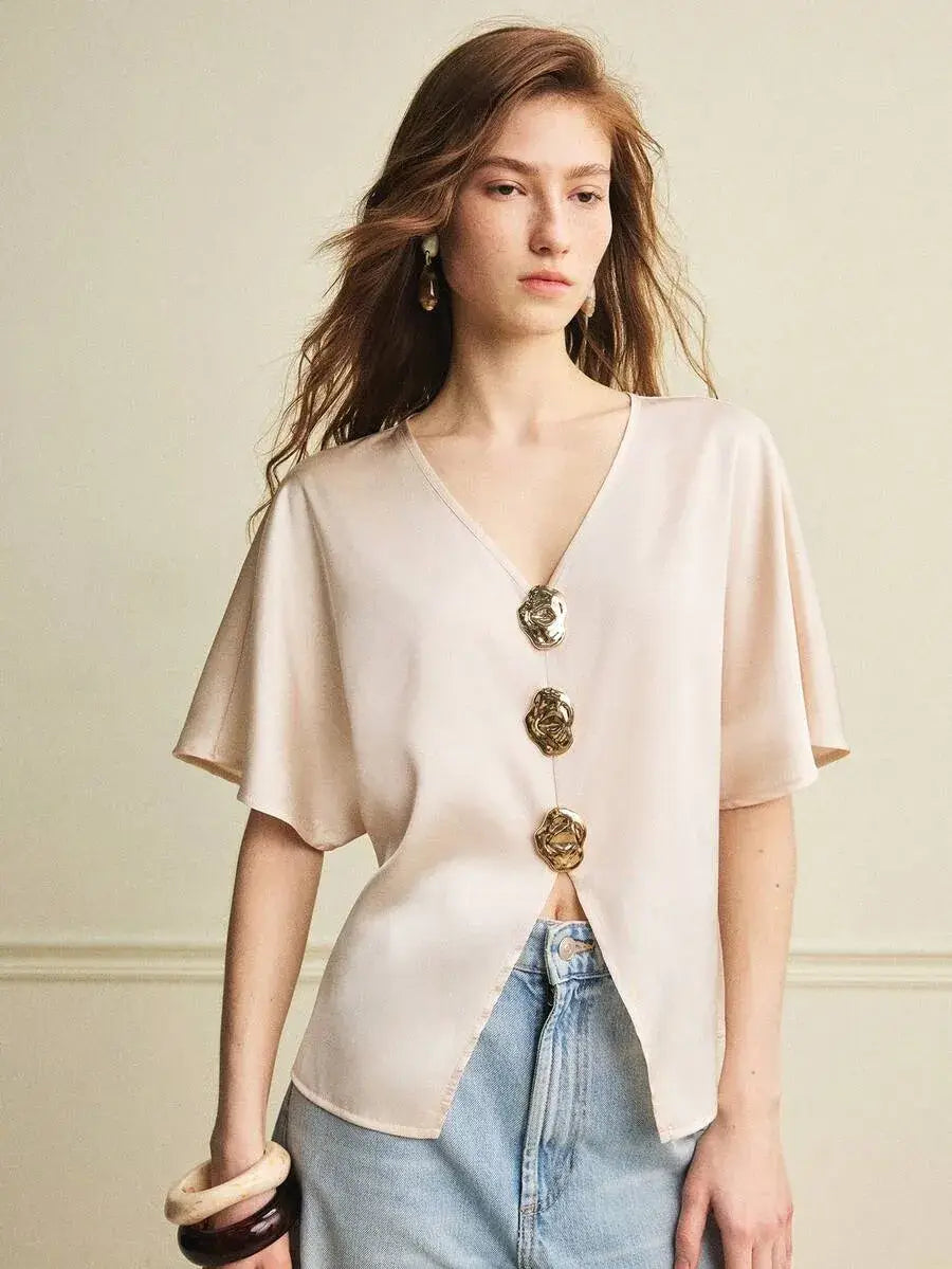 Blusa de mujer elegante con decoración de metal