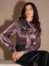 Blusa elegante y chic de cuello alto