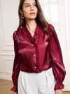 Blusa elegante de mujer con cuello de volantes
