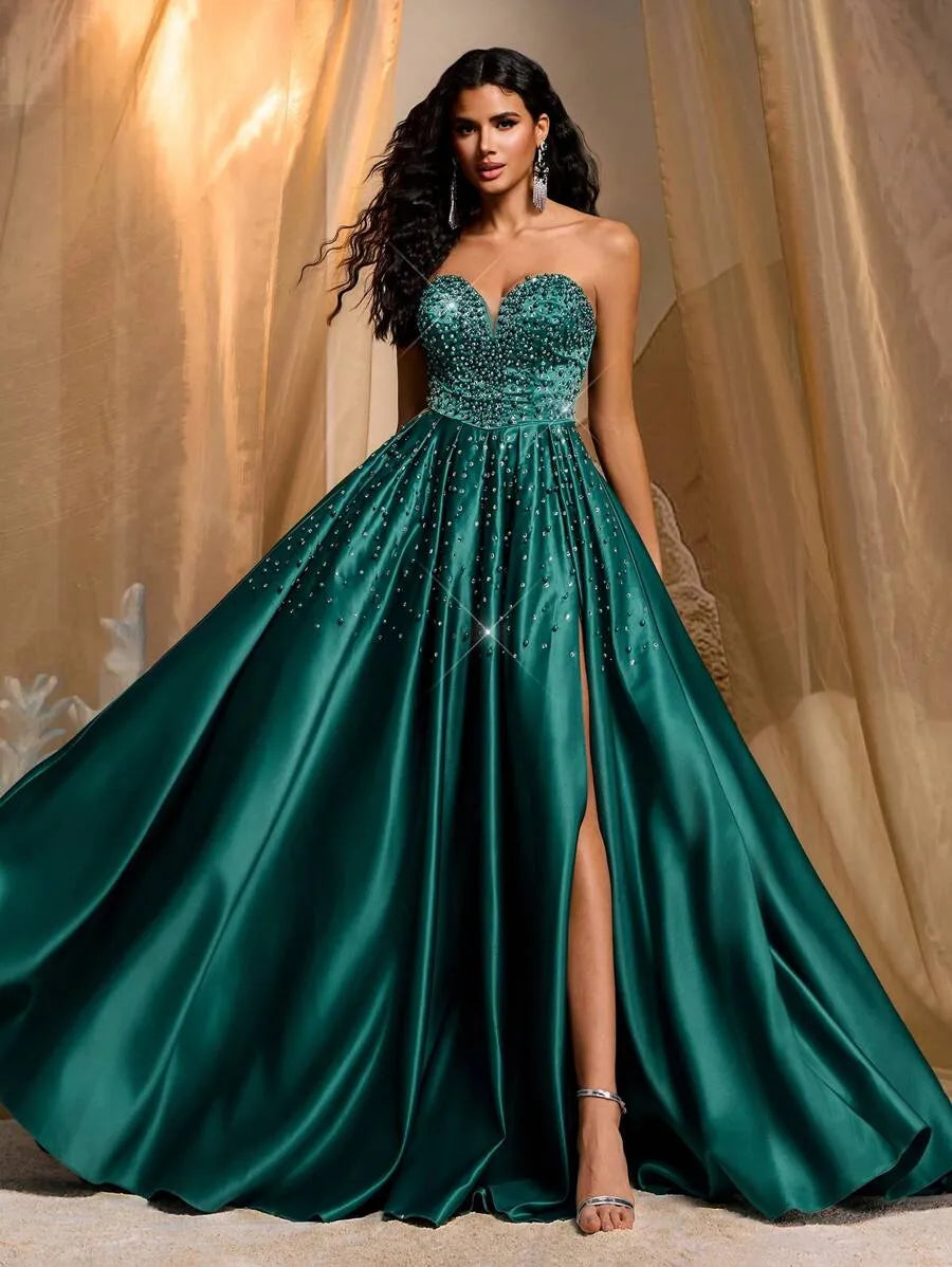 Vestido lujoso bustier abullonado de color verde esmeralda