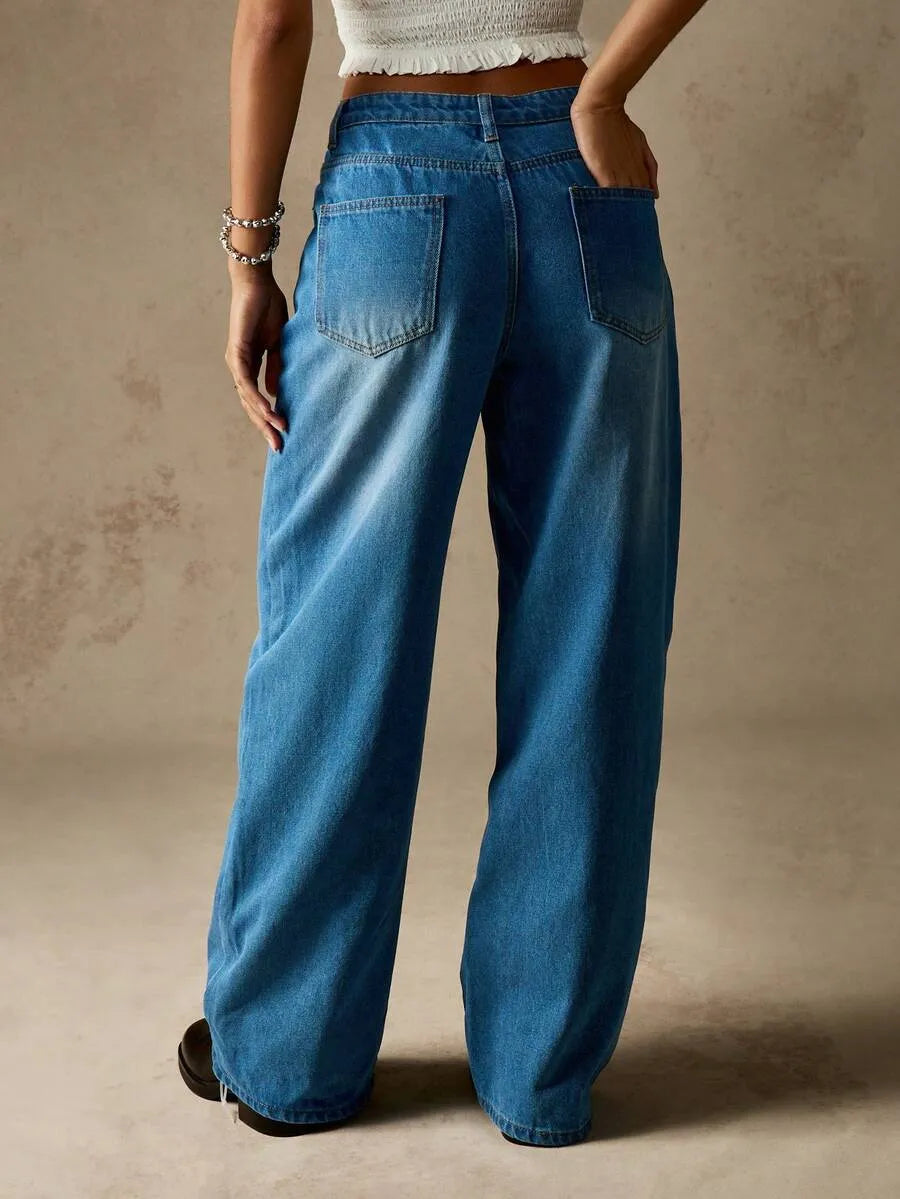 Jeans de pierna ancha con detalles de botones y cintura alta
