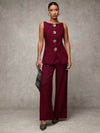 Conjunto de top sin mangas botones metalicos  y pantalones