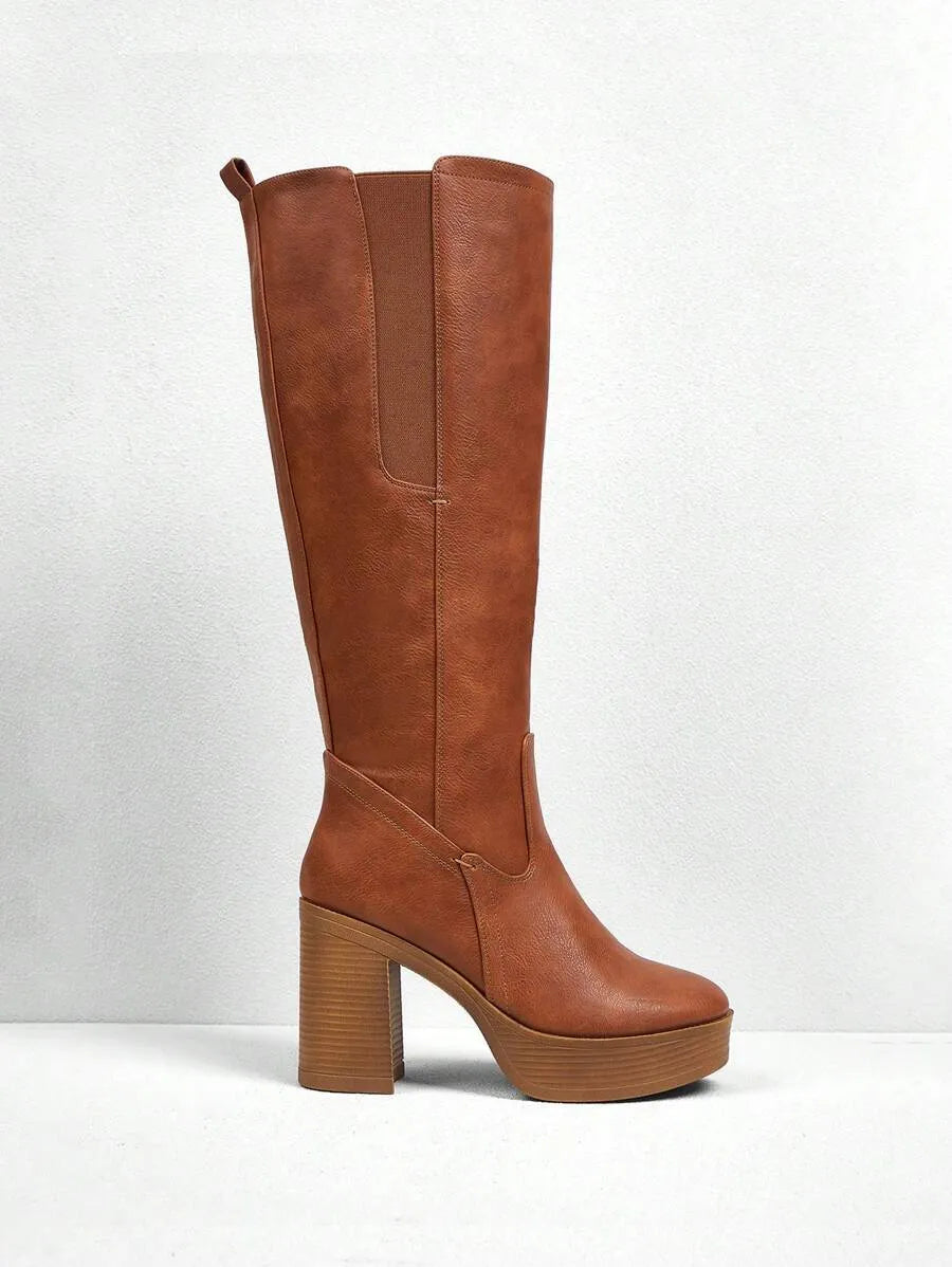 Botas occidentales de punta alta bordadas