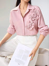 Blusa holgada abertura lateral y flores 3D