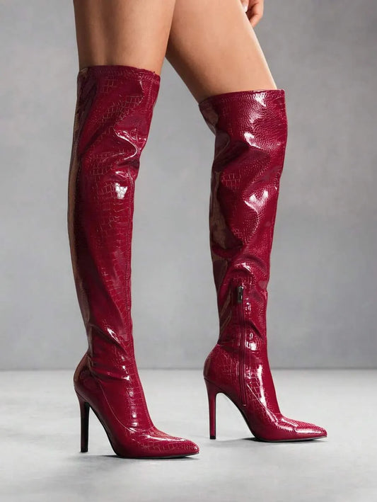 Botas altas de tacón de aguja y puntera afilada