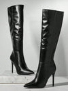 Botas de tacón de aguja y punta