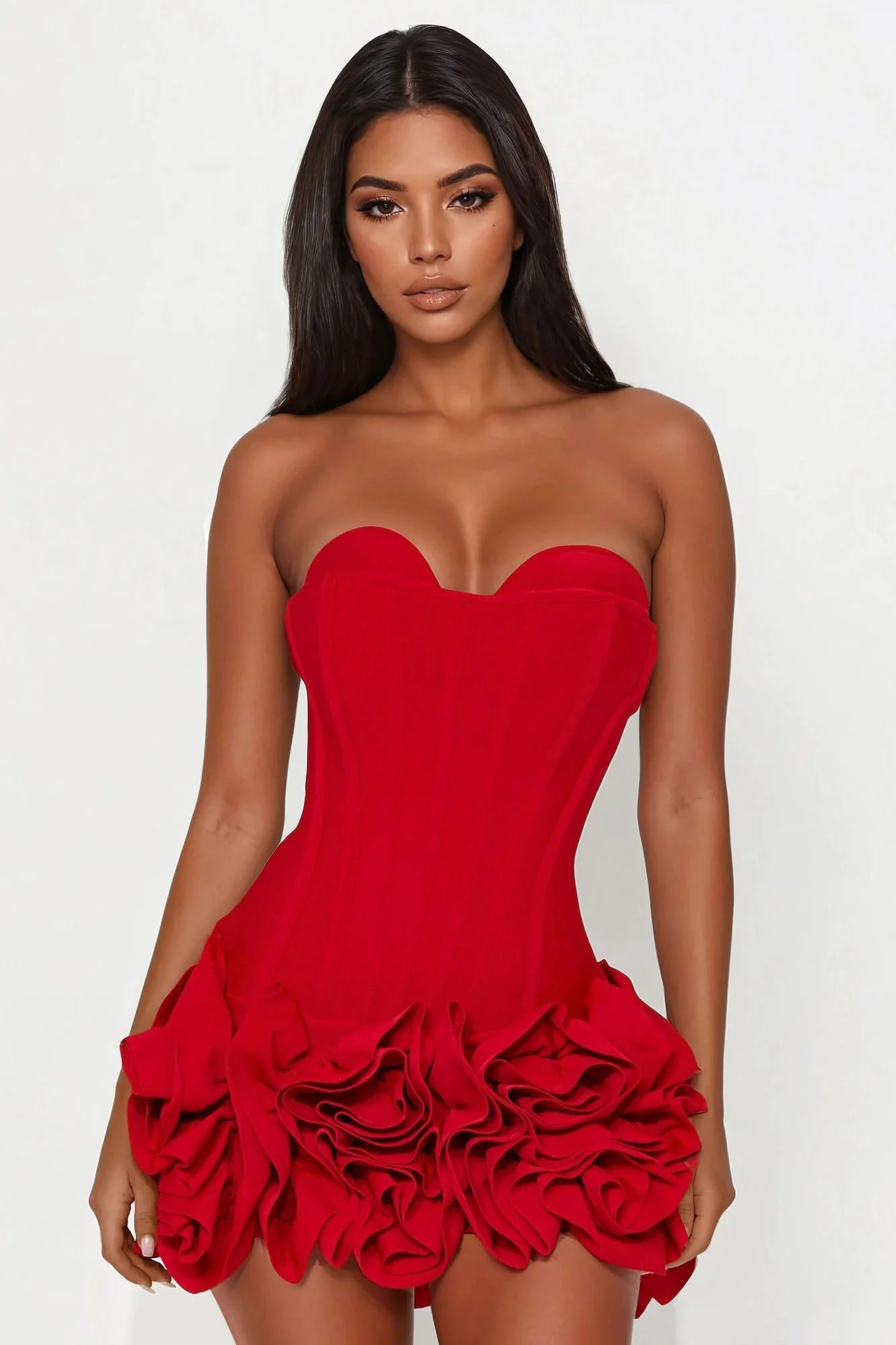 Vestido mini con volantes y rosetas