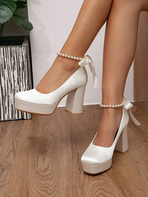 Zapatos de novia con lazo de perlas