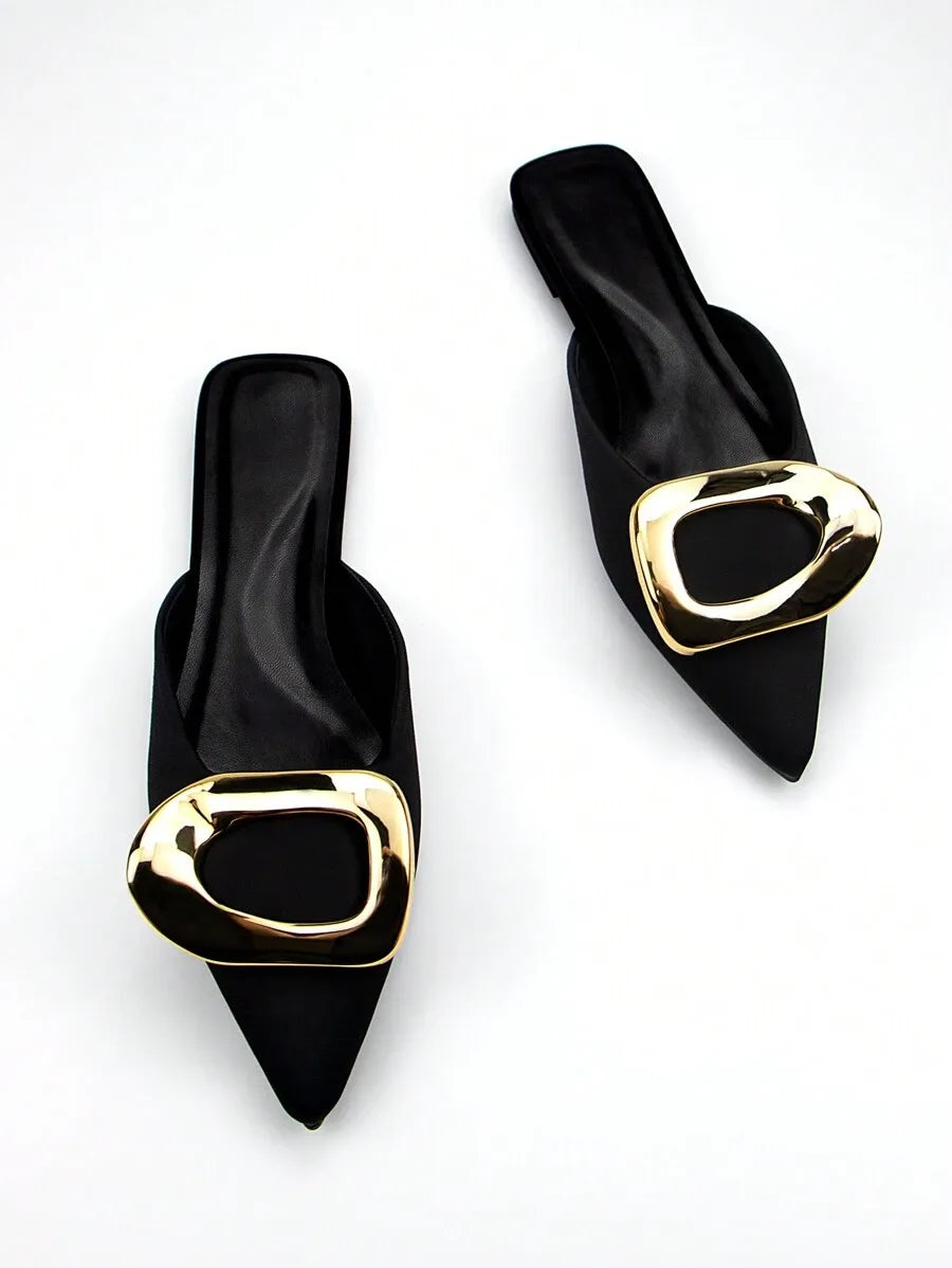 Zapatos mule planos con puntera puntiaguda