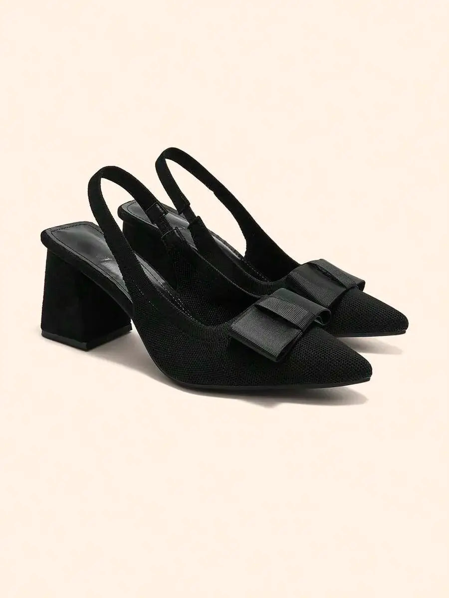 Zapatos de tacón de bloque con lazo