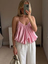 Top de seda rosa con pliegue