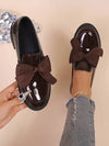 Zapatos planos con decoración de lazo