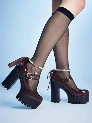 Tacones de plataforma con lazo de encaje y perla