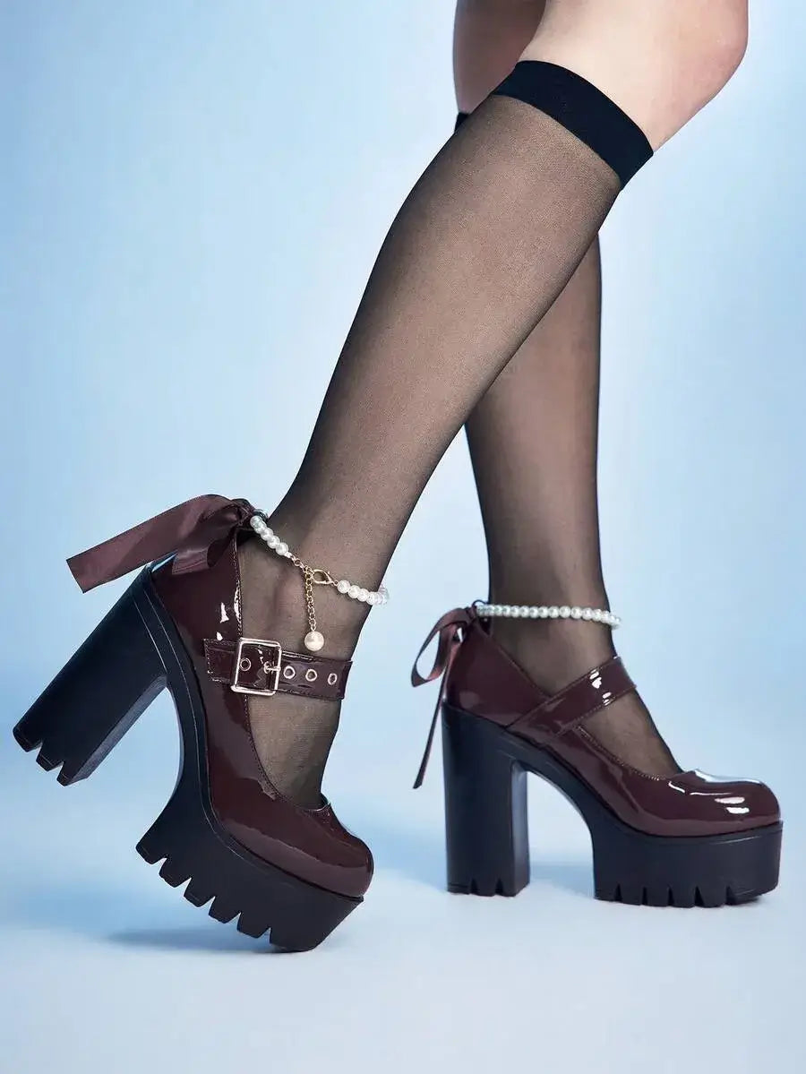 Tacones de plataforma con lazo de encaje y perla