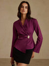 Blusa cuello redondo hebilla